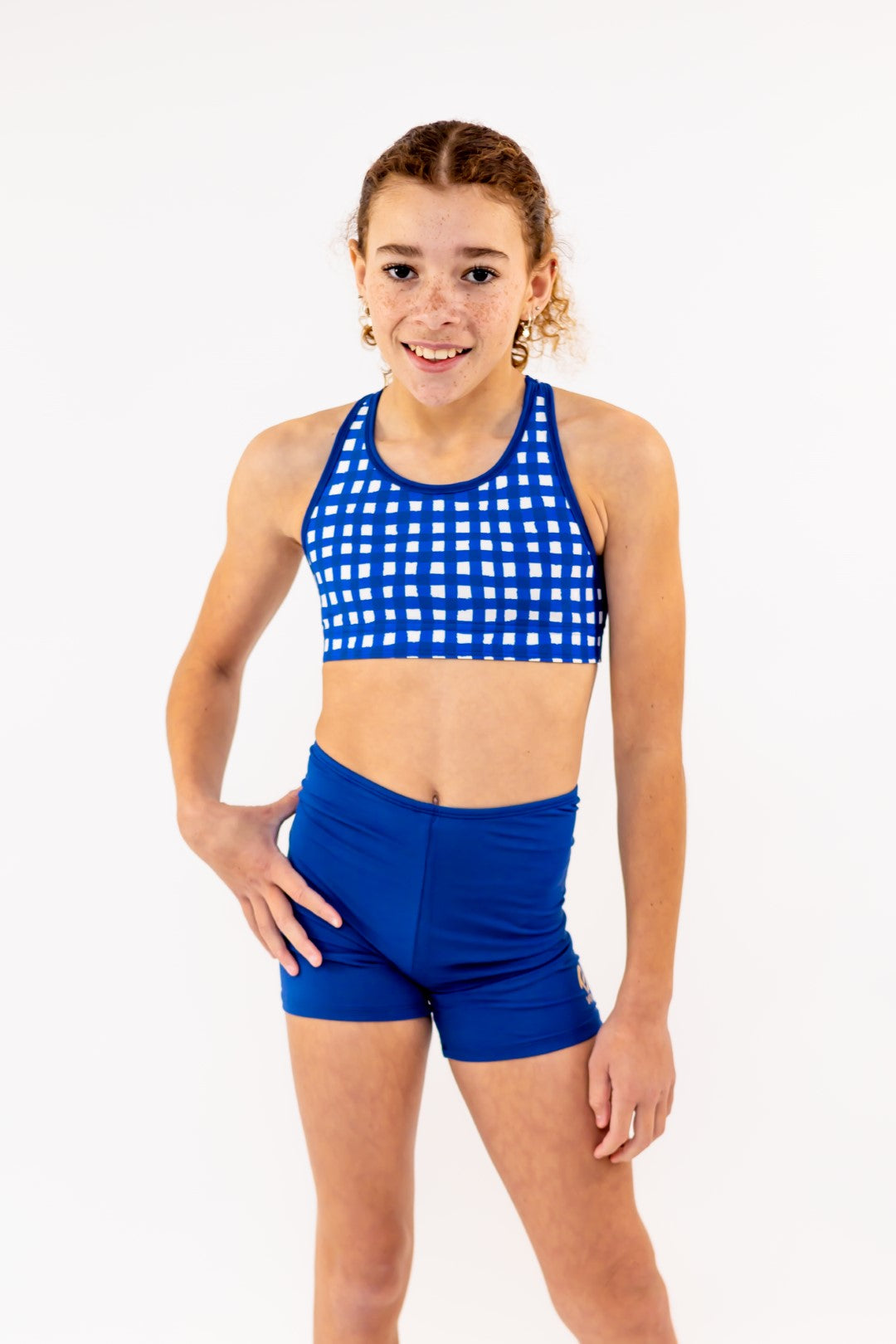 Navy Bike Shorts, Bike Pants with Gold Logo. Girls Activewear, Girls Gymnastics Wear, Girls Swimwear, Gymnastics Leotard, Dance Leotard, Booty Shorts, Crop top Set, Two Piece Set, Matching Leotard and Shorts, Bicycle Shorts, Gymnastics Australia, USA Gymnastics, Girls Leggings, Girls Tights, Girls Shorts. Coloured Bike Shorts.