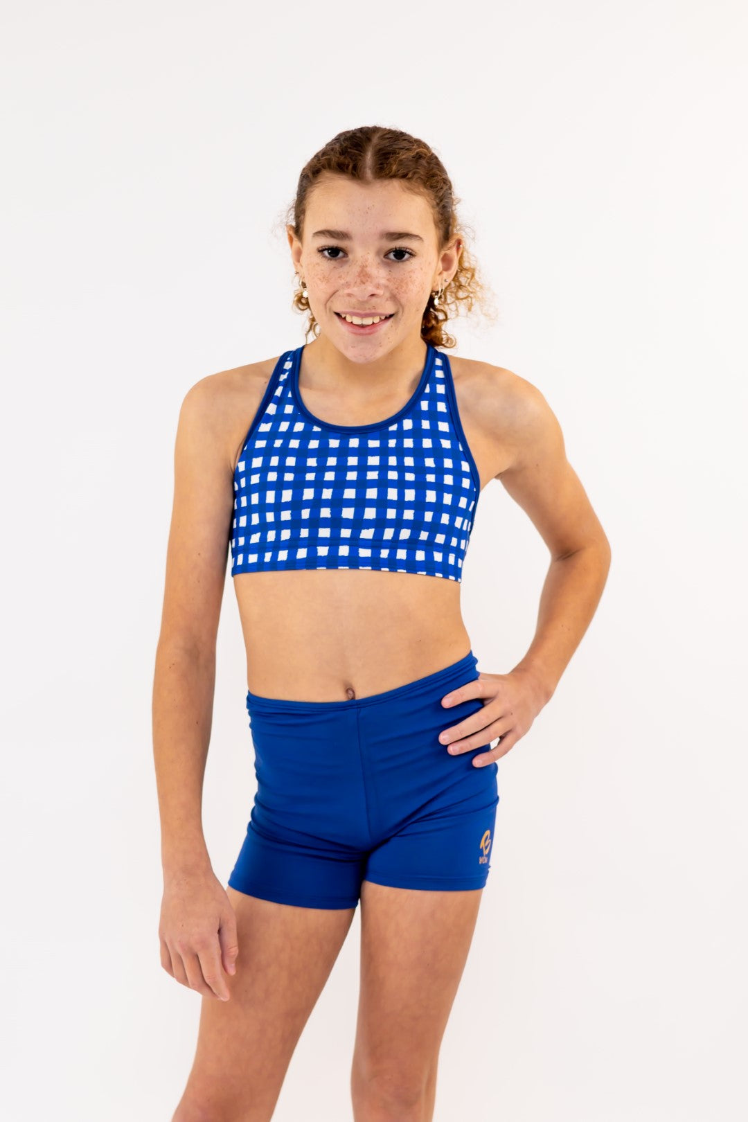 Navy Bike Shorts, Bike Pants with Gold Logo. Girls Activewear, Girls Gymnastics Wear, Girls Swimwear, Gymnastics Leotard, Dance Leotard, Booty Shorts, Crop top Set, Two Piece Set, Matching Leotard and Shorts, Bicycle Shorts, Gymnastics Australia, USA Gymnastics, Girls Leggings, Girls Tights, Girls Shorts. Coloured Bike Shorts.